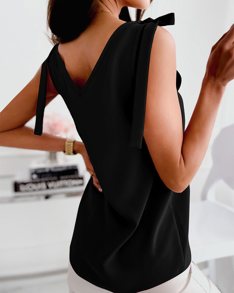 Strap thin one-color camisole with v-neckline