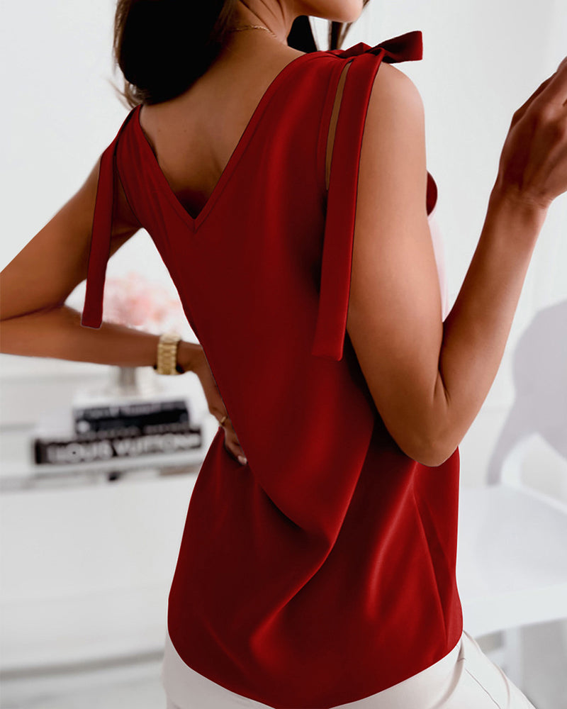 Strap thin one-color camisole with v-neckline