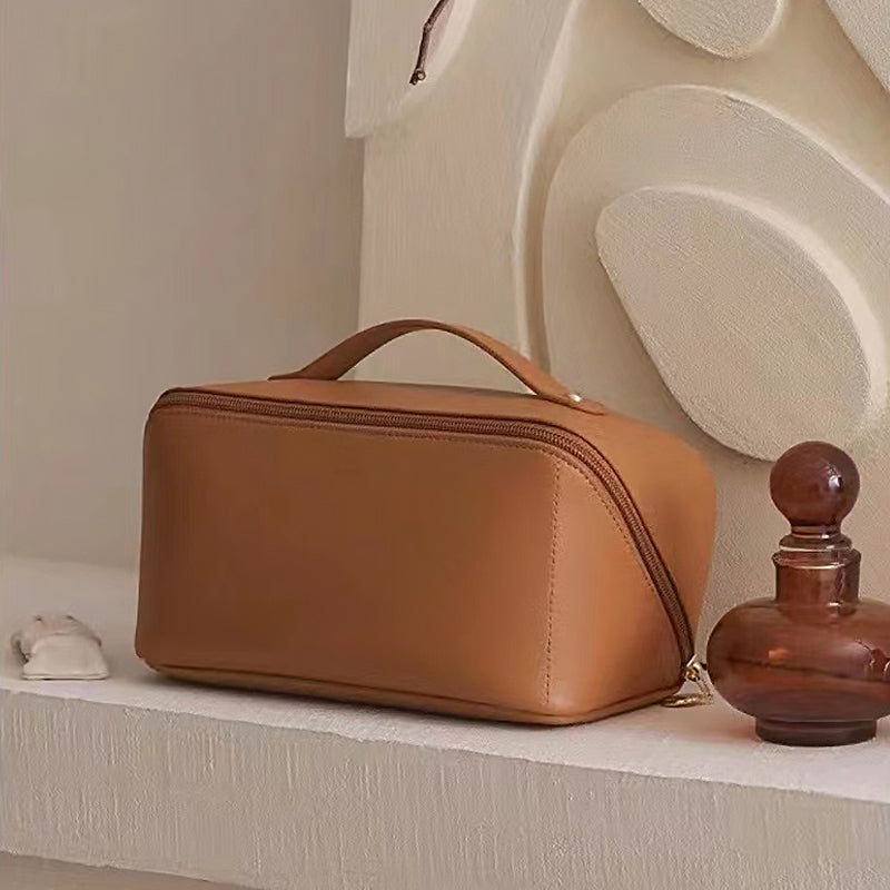 Portable leather travel cosmetic bag