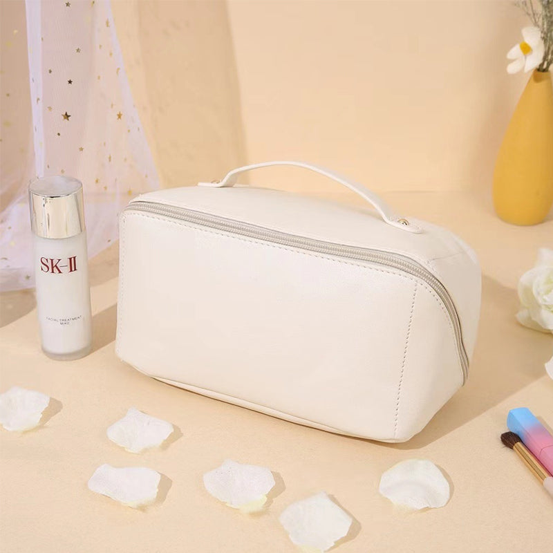 Portable leather travel cosmetic bag