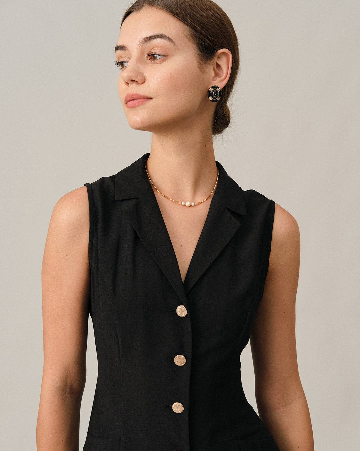 De zwarte tuniek midi-jurk met V-hals